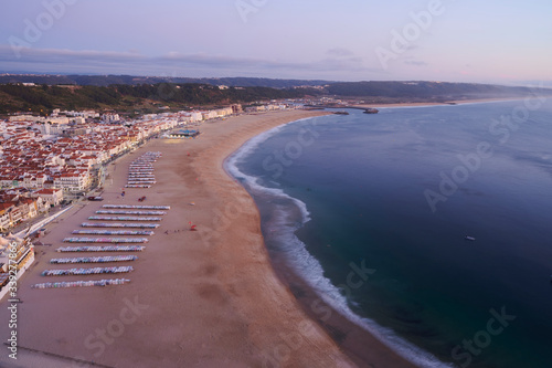 View at the end of the day over the town and beach of Nazaré