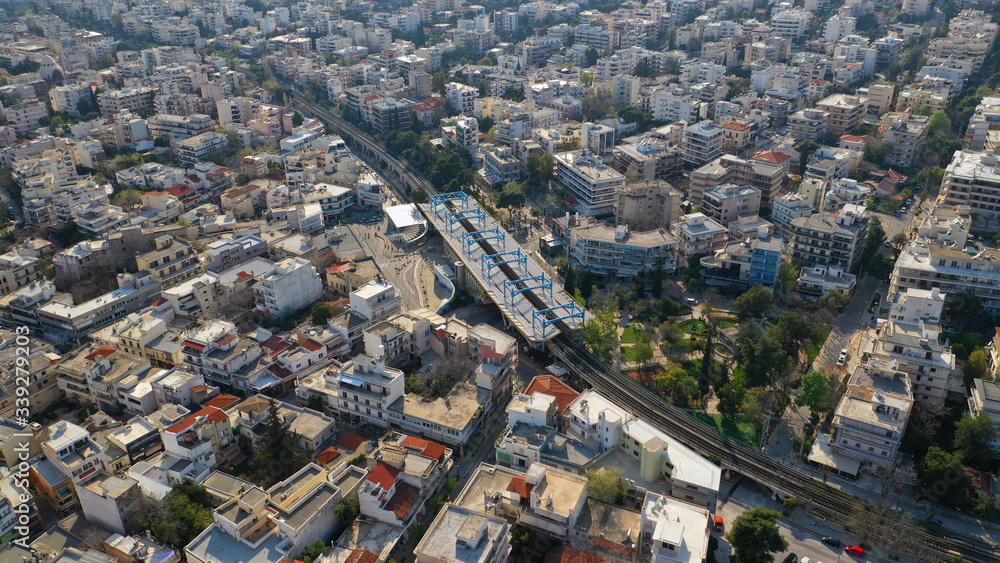 Obraz premium Aerial drone photo of main train station of Marousi centre and district, North Athens, Attica, Greece