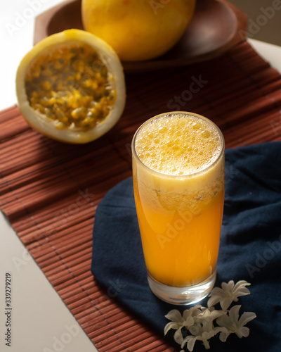 passion fruit juice in long glass cup photo