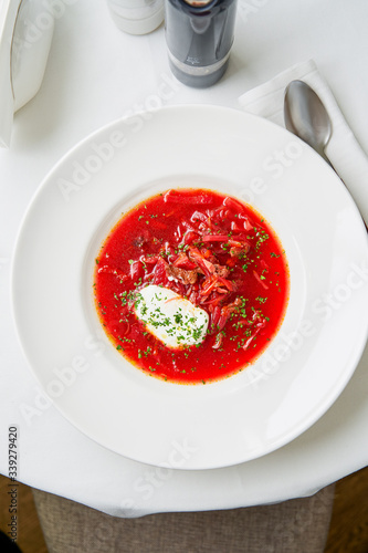 Russian-style beetroot and tomato borscht soup photo