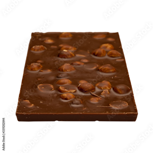 chocolate bar with nuts on a white background