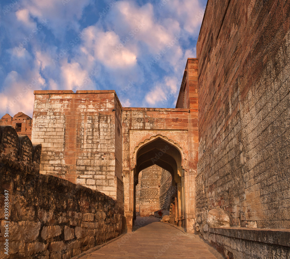 Main gate of famous ancient Mehrangarh Fort at sunset in Jodhpur, Rajasthan, India