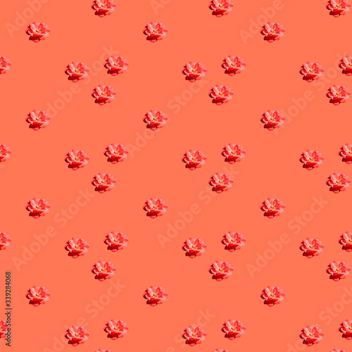 Pattern with rosaceae on a orange background