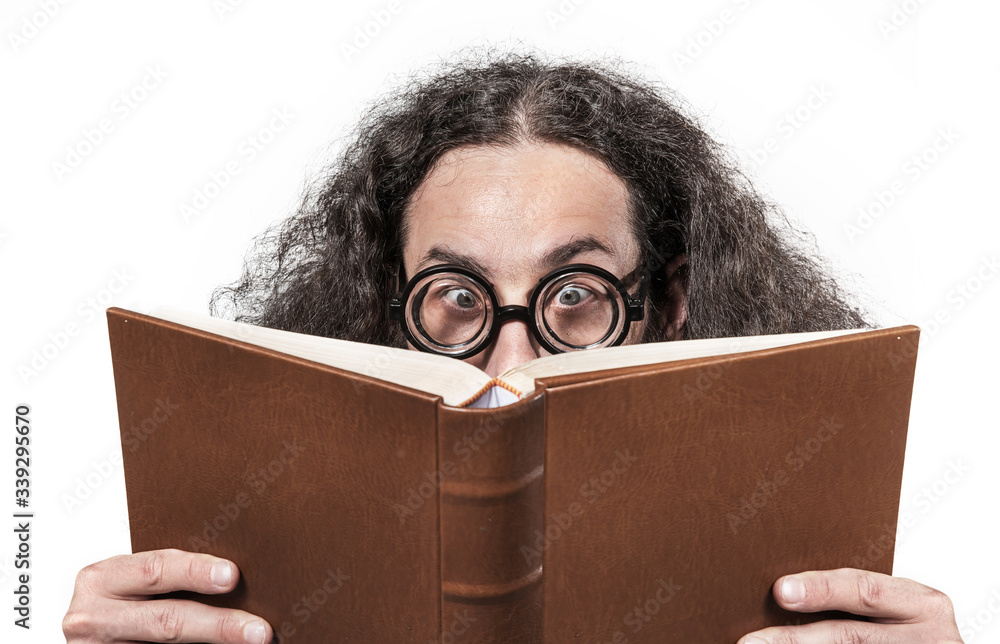 Eccentric, young nerd reading a book - obrazy, fototapety, plakaty 