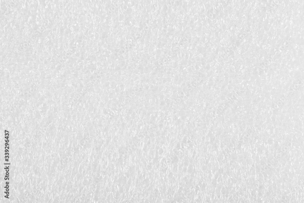 Obraz premium White plastic package background texture close up. Top view.