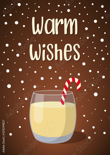 Christmas invitation card with traditional eggnog in a glass glass with a candy cane on a green background with the inscription "Warm wishes" 