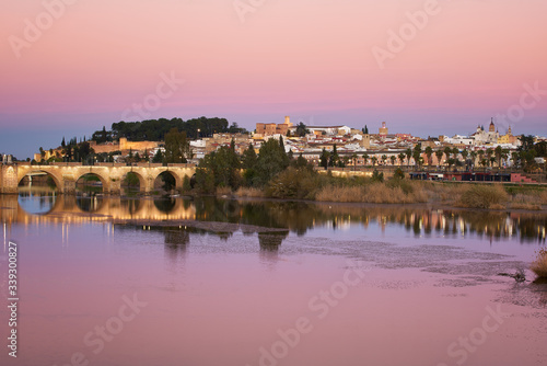 Badajoz city at sunset with river Guadiana in Spain photo
