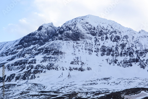 Beautiful snow capped mountains against the sky in Iceland