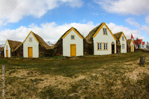 rural houses with a roof made of grass. The Icelandic landscape photo
