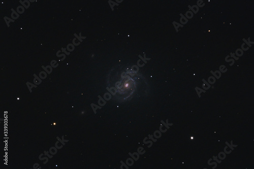 The intermediate spiral galaxy Messier 100 in the constellation Coma Berenices photographed with a Maksutov telescope from Mannheim in Germany.