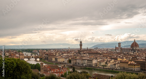 Panoramic view of Florence, Italy viewed from Piazzale Michelangelo before sunset with the view of Arno river © Simone