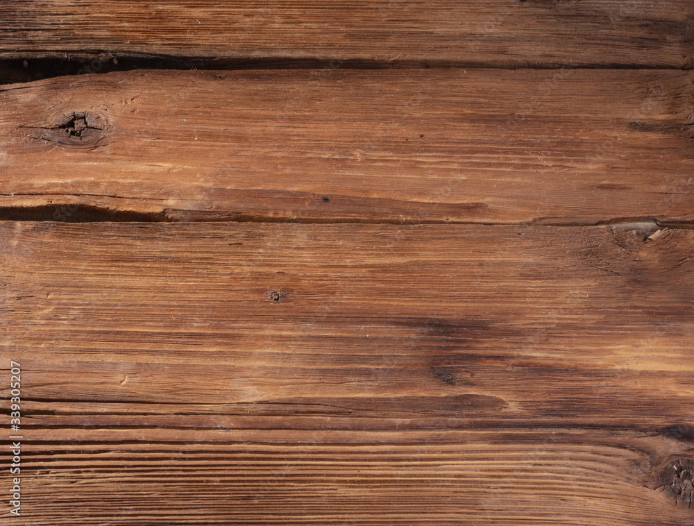 Fototapeta premium Brown oak wooden texture background, close up. Macro texture of oak layers