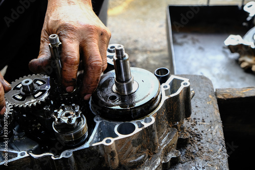 Motorcycle engine mechanic, assemble motorcycle parts