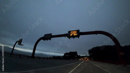 Car driving through the steep streets of San Francisco city. View from the car.