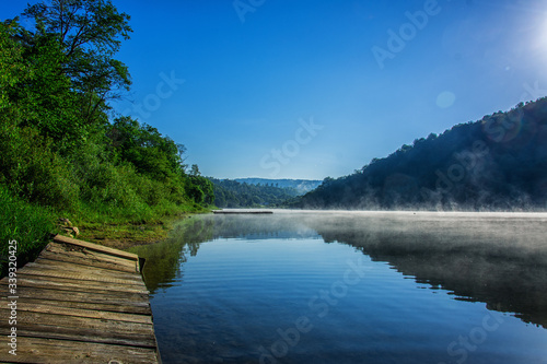 Fototapeta Naklejka Na Ścianę i Meble -  Blue reflection at lake