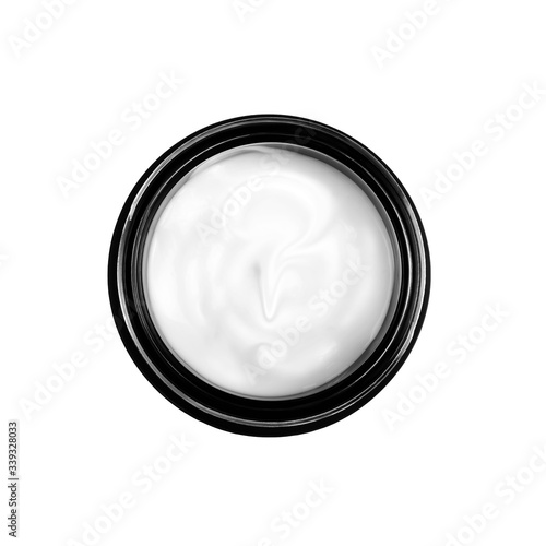 beauty cream in a jar in the shape of a question mark isolated on white background, top view, no shadow, for collage