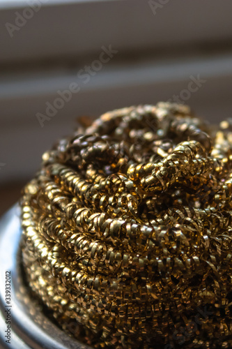 close detailed image of a small decorative gold tinsle
