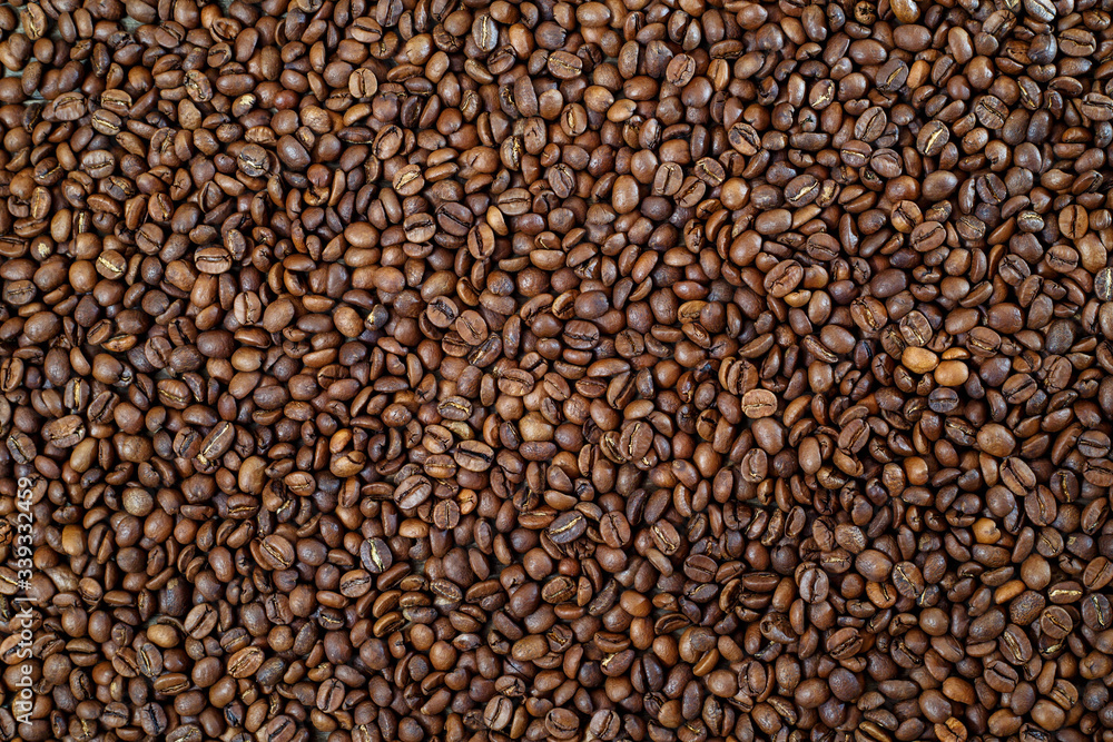 Aromatic roasted coffee beans on the table Aromatic roasted coffee beans on the table