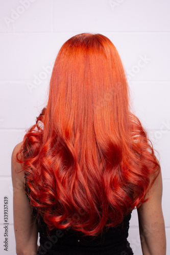 Long red straight girl with bright red shoulders