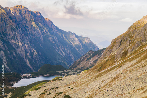 mountain, sky, landscape, tatra, tatry, nature, szpiglaskowy wierch, clouds, rock, mountains, cloud, peak, hill, blue, travel, stone, rocks, top, summer, outdoors, view, rocky, tree, beautiful, green © Maciej