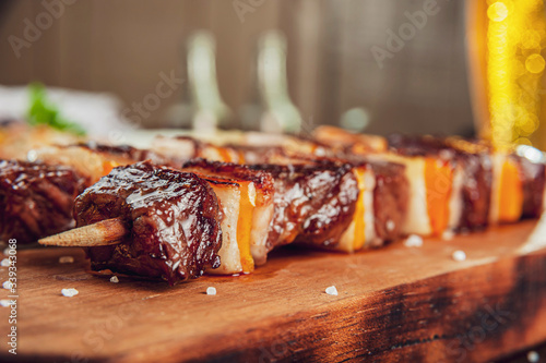 Grilled meat stick in close-up - Brazilian espetinho de carne