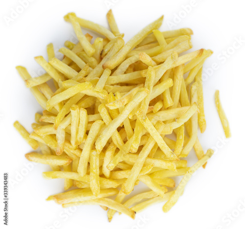 Crispy French Fries isolated on white background (close-up shot)