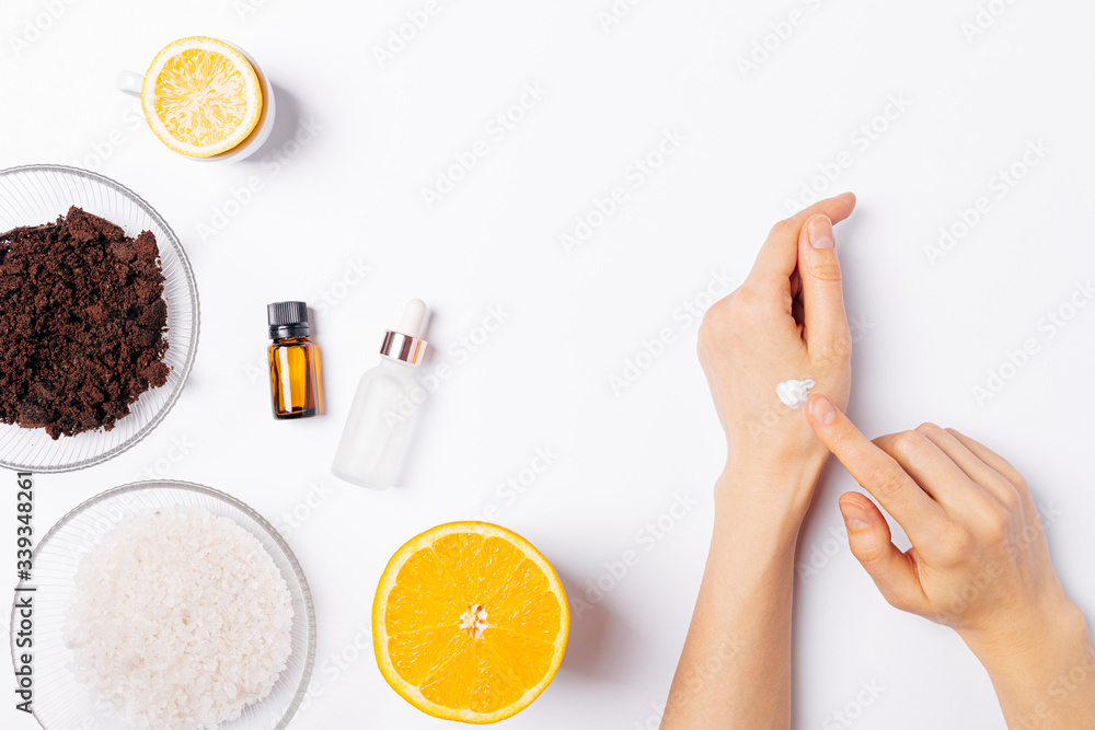 Homemade skin care, female's hands apply cream Homemade skin care, female's hands apply cream