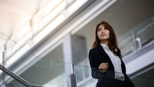 Beautiful asian business woman in modern office