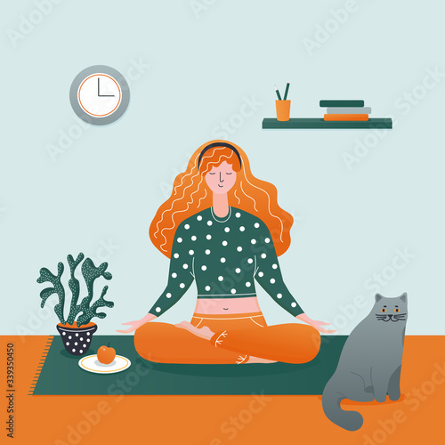 Girl in lotus pose. Practices meditation. Woman stay home in quarantine. Cute british shorthair cat and cactus houseplant.