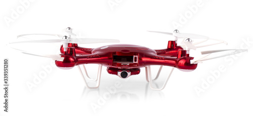 red drone flying isolated on white background. Clsoe up of fly drone