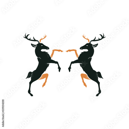 Royal heraldic Two noble deers standing. Vintage black design of heraldry animals vector emblem. 