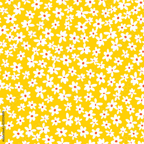 Vector yellow scattered fun daisy flowers repeat pattern with orange center. Suitable for textile, gift wrap and wallpaper.