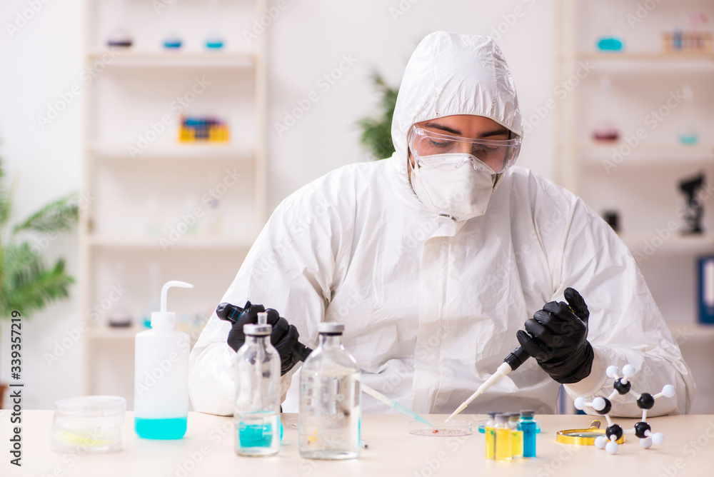 Doctor working in lab in coronavirus COVID-19 concept Doctor working in lab in coronavirus COVID-19 concept