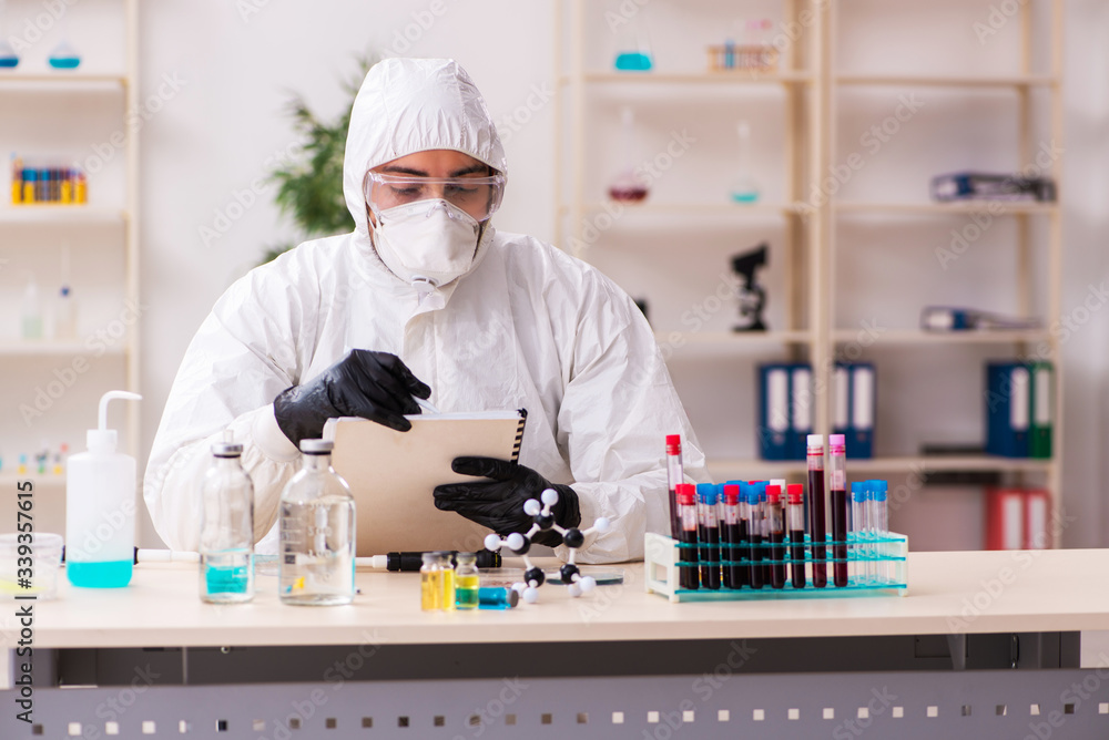 Doctor working in lab in coronavirus COVID-19 concept Doctor working in lab in coronavirus COVID-19 concept