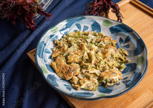 Fried Eggs with Toona Sprouts