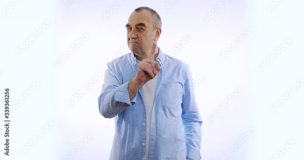 Man saying no by waving his finger on white background. Man saying no by waving his finger on white background.