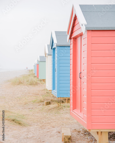 Papier peint Findhorn, Scotland - July 2016: Colourful beach huts along the coast at Findhorn