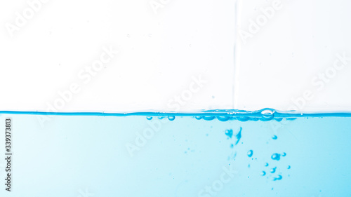 Water splash and ripple isolated on white background