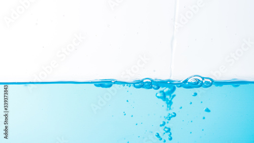 Water splash and ripple isolated on white background