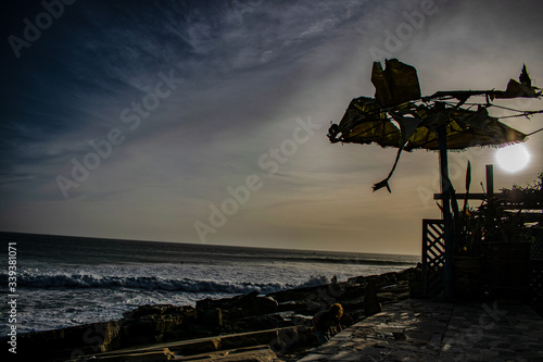 Broken umbrella by the seaside © J.Roten