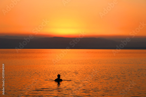 surfer at sunset © Feras