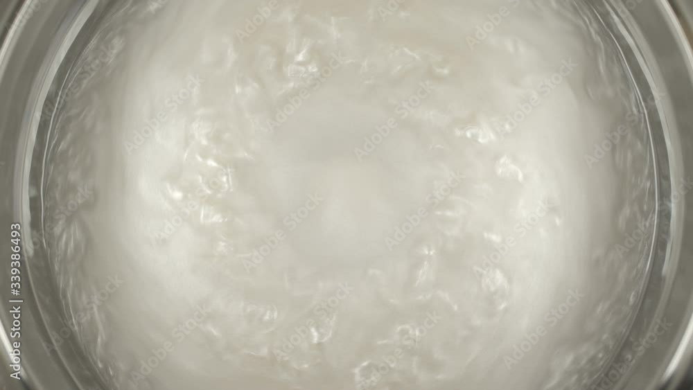 Rheoscopic fluid. Beautiful movement of particles in a liquid. Fantastic patterns and shapes. Rheoscopic fluid. Beautiful movement of particles in a liquid. Fantastic patterns and shapes.