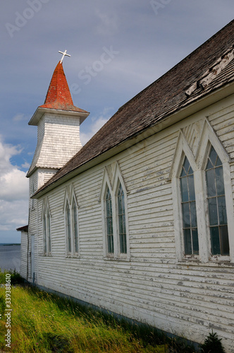 Tablou pe pânză Bent steeple with cross of Anglican Christ Church at Clarke's Head Gander Bay Ne