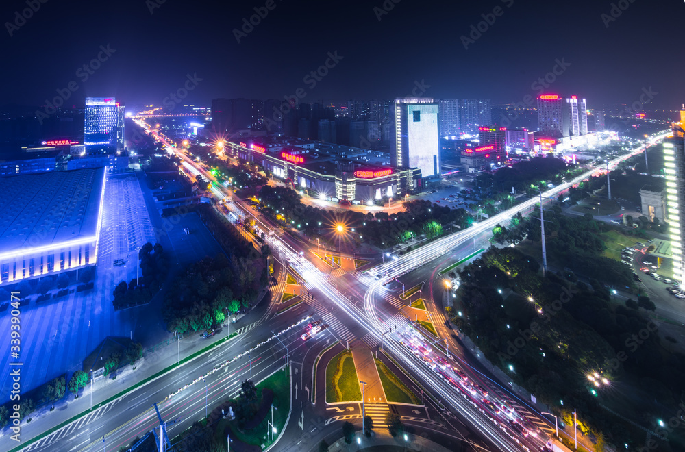 High Angle View Of Illuminated Road Amidst Cityscape At Night