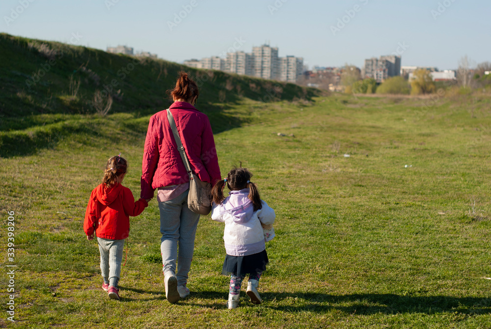 family walking in the park