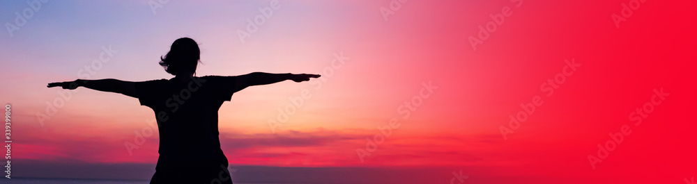 Banner of woman play yoga silhouette on the beach