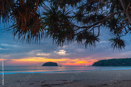 unset in the channel of Pu island at Kata beach Phuket Thailand