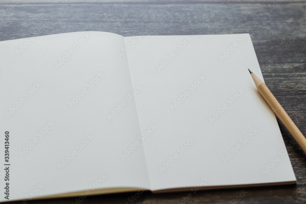 Download Caption: Blank Journal with Pencil Ready for Idea Generation  Wallpaper