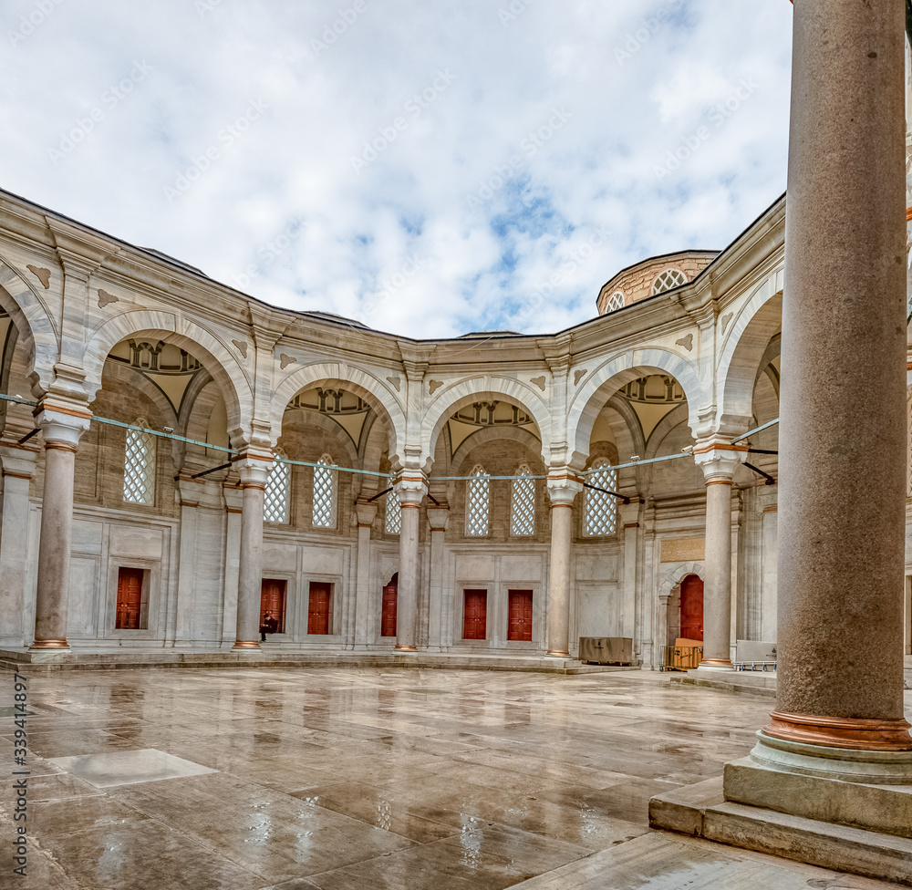 Old mosque in Istanbul with minarets and courtyard
