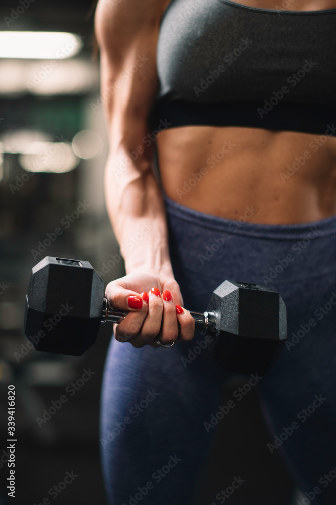 Fitness woman on training. Young woman in the gym. Fitness woman on training. Young woman in the gym.